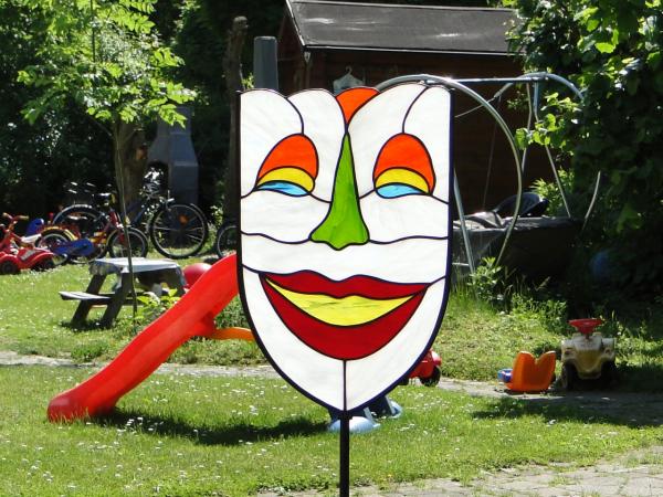 Designvorlage Gartenkunst Clown